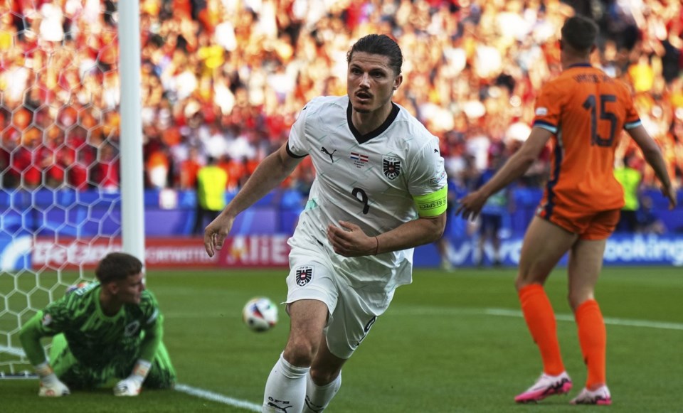 Austria beats Netherlands 3-2 to reach knockout stage of Euro 2024.