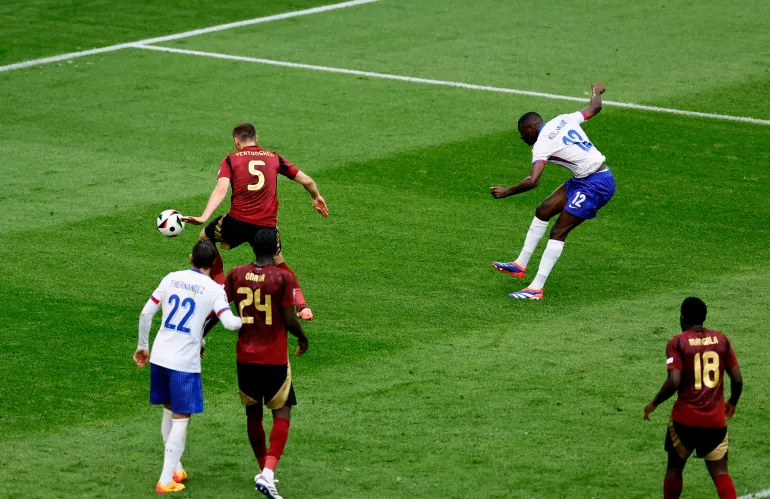 France reach Euro quarter-finals after late Vertonghen own goal for Belgium.